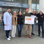 Yardbird-Ensemble übergibt Spendenscheck an krebskranke Kinder